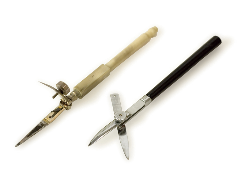 Ruling pens with the blades open (L: English; R: German)